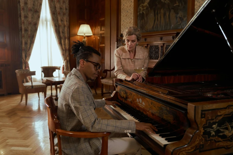 a man sitting at a piano next to a woman, antipodeans, gustavo fring, **cinematic, harry, thumbnail