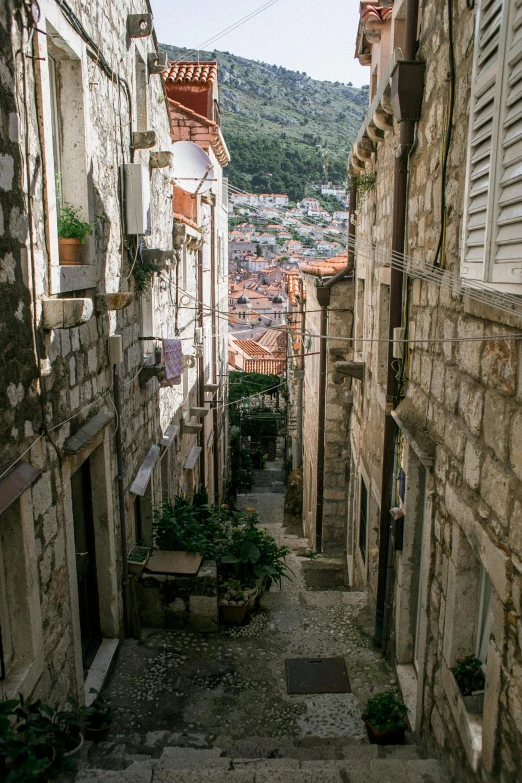 a narrow street in the old town of dubna, croatia, unsplash contest winner, dubrovnik, city on a hillside, square, good light