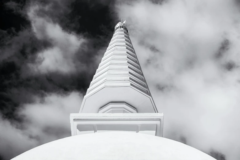 a black and white photo of a tall white building, unsplash contest winner, minimalism, sri lanka, pagoda, white in color, dome