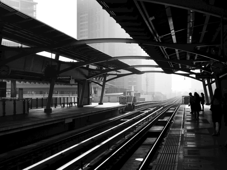 a black and white photo of a train station, inspired by Cheng Jiasui, flickr, chicago, square, :: morning, 2 0 0 2 photo