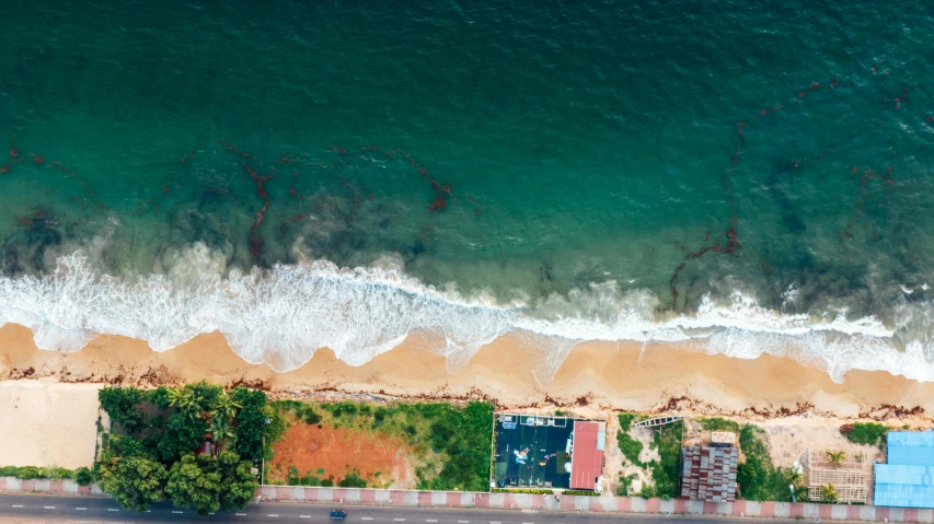 an aerial view of a beach next to the ocean, pexels contest winner, hurufiyya, colombo sri lankan city street, thumbnail, flattened, profile pic