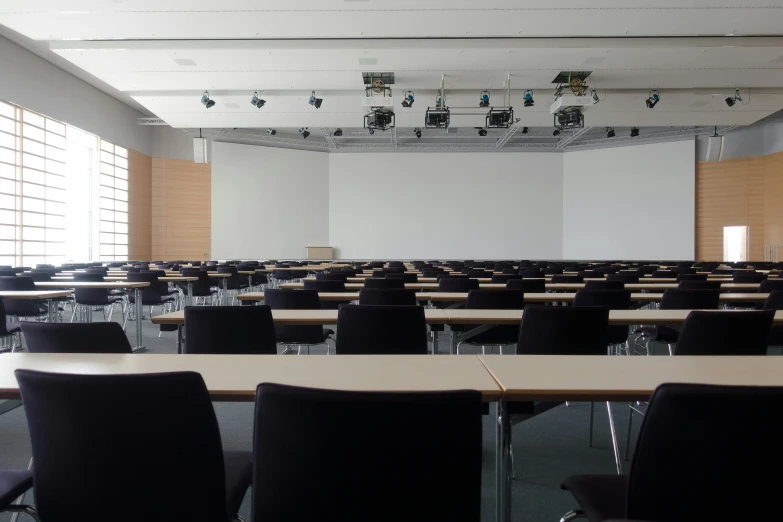 a room filled with lots of tables and chairs, a portrait, unsplash, heidelberg school, plain background, no - text no - logo, theater, range murata