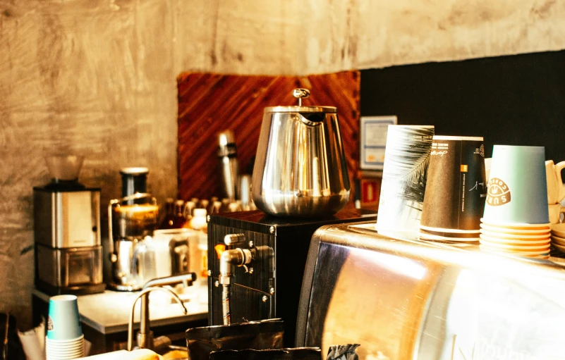 a coffee machine sitting on top of a counter, a still life, by Yasushi Sugiyama, unsplash, arasaka, curated collections, thumbnail, burned