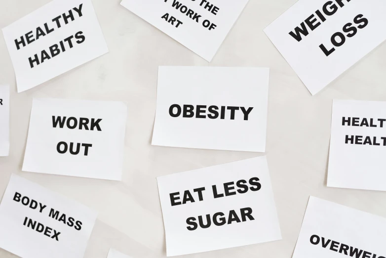a bunch of pieces of paper with words on them, by Arabella Rankin, trending on pexels, new objectivity, obese ), health, minimalistic aesthetics, 15081959 21121991 01012000 4k