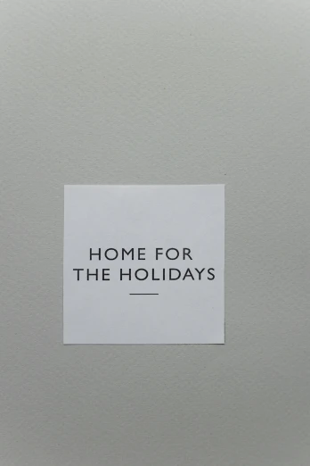 a piece of paper with the words home for the holidays written on it, by Adam Pijnacker, tumblr, sōsaku hanga, 2 5 6 x 2 5 6, minimalist sticker, mamiya, label