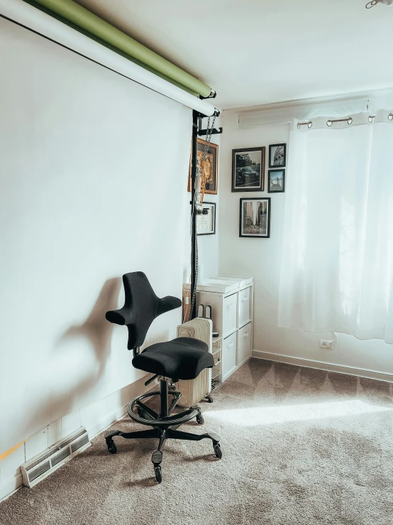 a chair sitting in front of a white wall, profile image, furnished room, surgery, location in a apartment