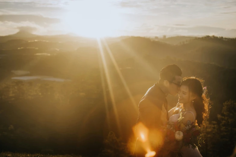 a couple standing next to each other on top of a hill, unsplash contest winner, romanticism, sunflare, jin shan and ross tran, wedding, soft lighting from above