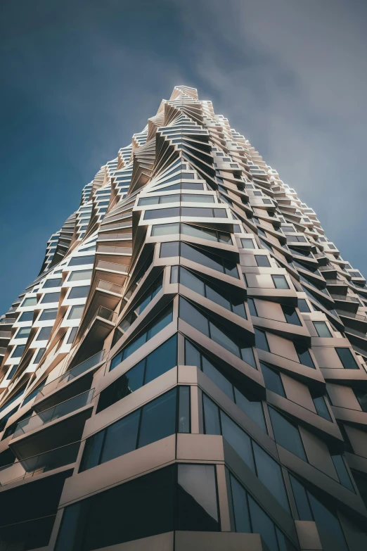 a very tall building with lots of windows, inspired by Zaha Hadid, unsplash contest winner, van herpen, san francisco, 8k resolution”, up-angle view