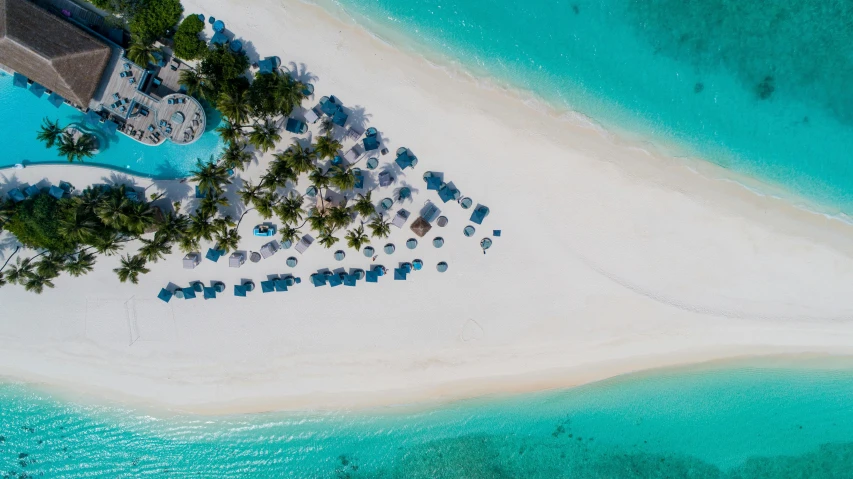 an aerial view of a white sandy beach, by Julian Allen, hurufiyya, tropical pool, turquoise blue face, dessert