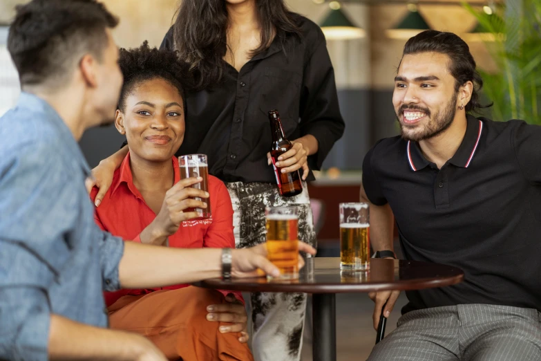 a group of people sitting around a table drinking beer, profile image, digital image