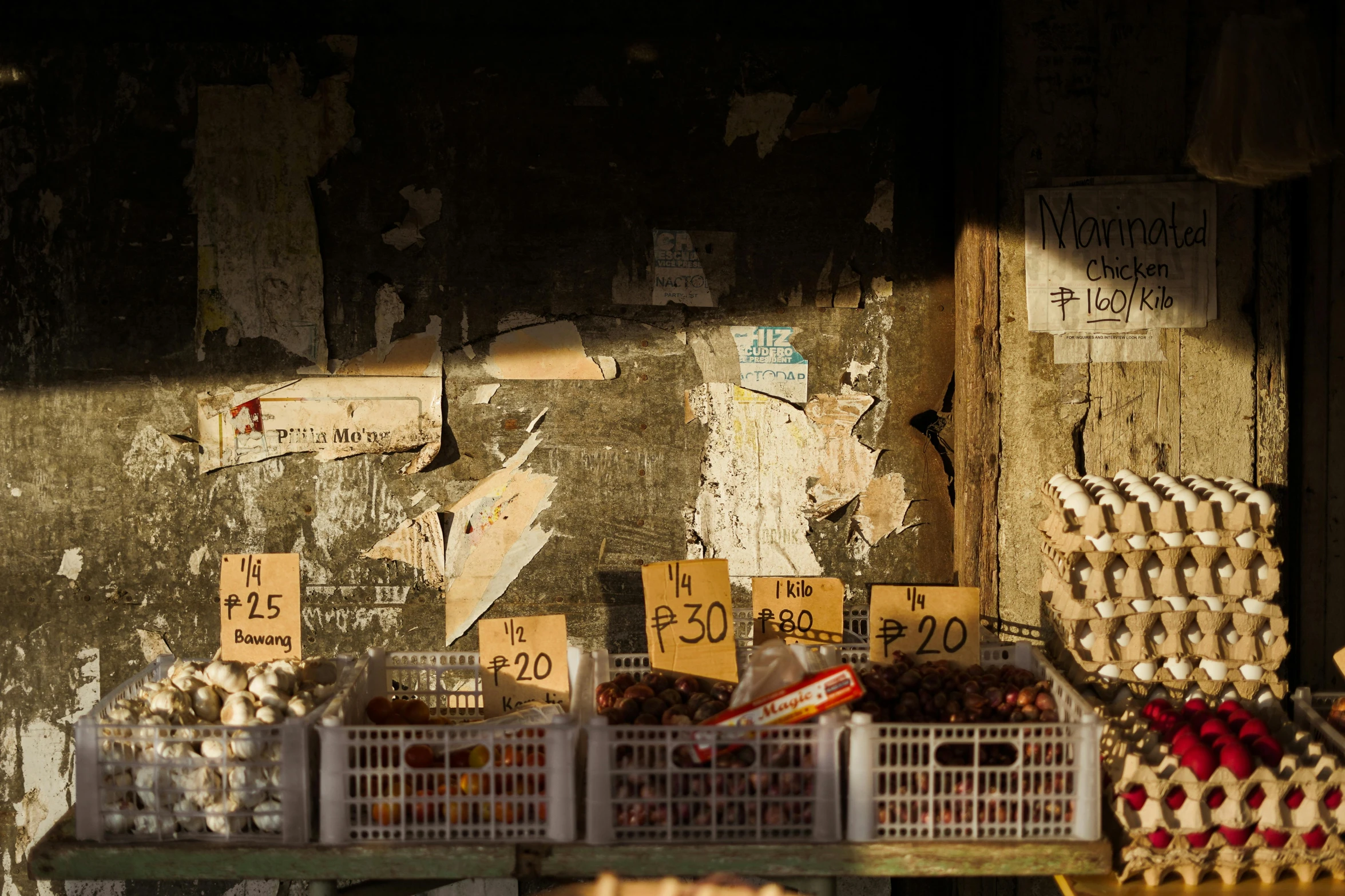 a bunch of eggs sitting on top of a table, by Elsa Bleda, pexels contest winner, renaissance, lots of signs and shops, decaying dappled sunlight, philippines, late afternoon light