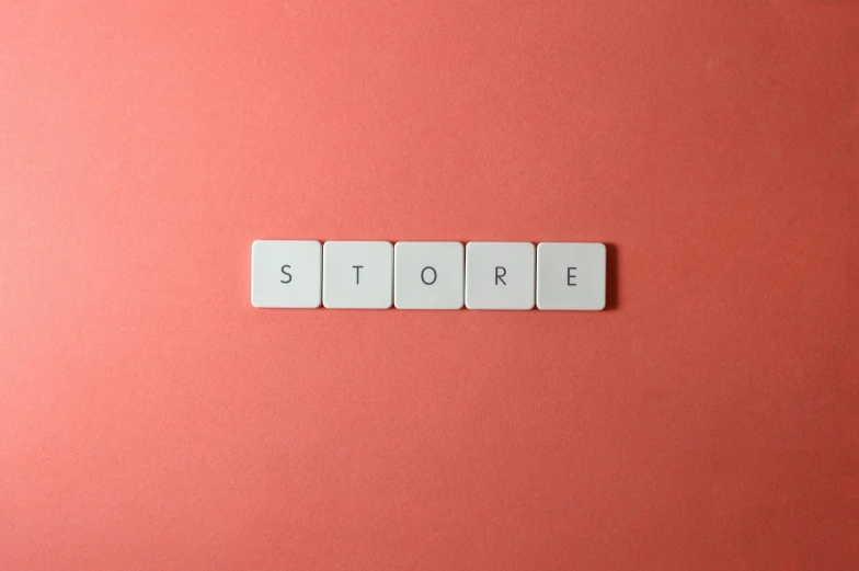 the word store spelled with white tiles on a pink background, by Andries Stock, trending on pexels, square shapes, cloud storage, small, coral