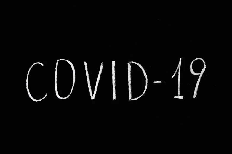 a blackboard with the words covidid - 19 written on it, an album cover, pixabay, covid, black stencil, found footage video, adult swim