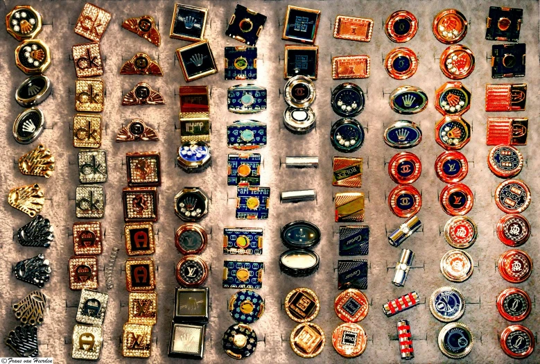 a table topped with lots of different types of watches, a mosaic, flickr, assemblage, 1999 photograph, micro machines, 64x64, azulejo