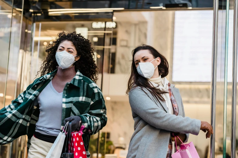 two women wearing face masks and carrying shopping bags, a photo, by Meredith Dillman, trending on pexels, renaissance, people watching, plague and fever. full body, 64x64, il