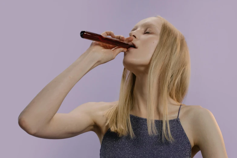 a woman drinking a beer from a bottle, by Attila Meszlenyi, trending on pexels, hyperrealism, vocal tract model, portrait of kim petras, young girl playing flute, clemens ascher