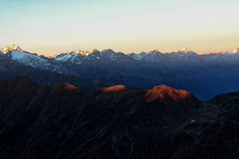 a view of the mountains from the top of a mountain, by Matthias Weischer, pexels contest winner, les nabis, uttarakhand, sunset lighting 8k, 4 k cinematic panoramic view, brown