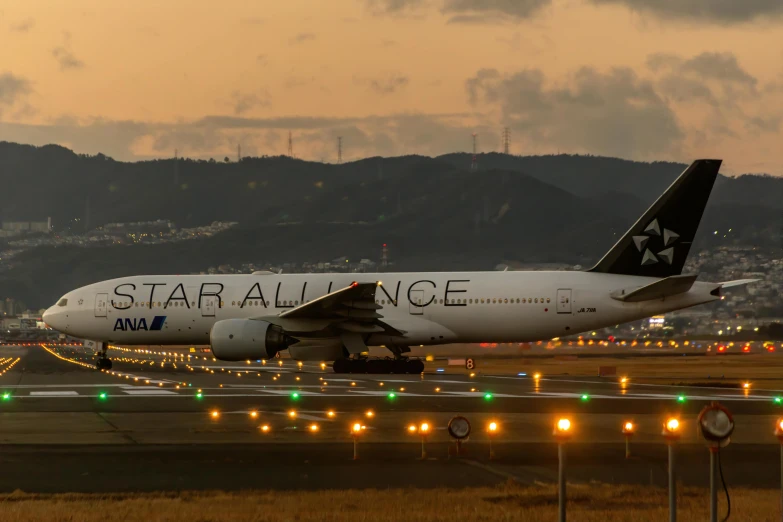 a large jetliner sitting on top of an airport runway, pexels contest winner, renaissance, stars, tokyo, avatar image, front lit