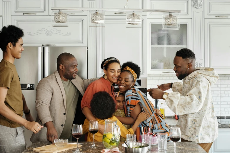 a group of people standing around a kitchen counter, pexels contest winner, renaissance, loving embrace, african canadian, happy family, youtube thumbnail