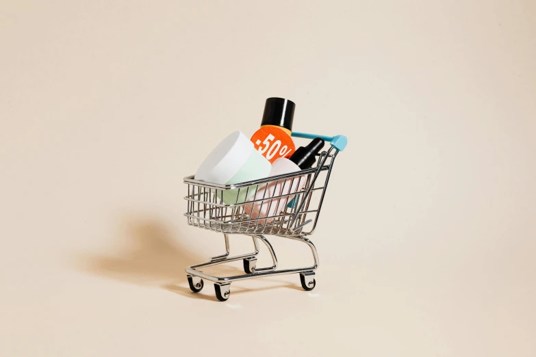 a small shopping cart filled with makeup products, society 6, shot on hasselblad, trending on dezeen, shopping cart icon