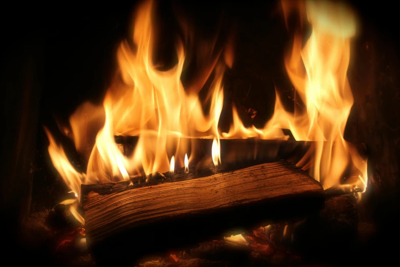 a close up of a fire burning in a fireplace, by Rodney Joseph Burn, hurufiyya, fan favorite, instagram picture, highly rendered, a wooden