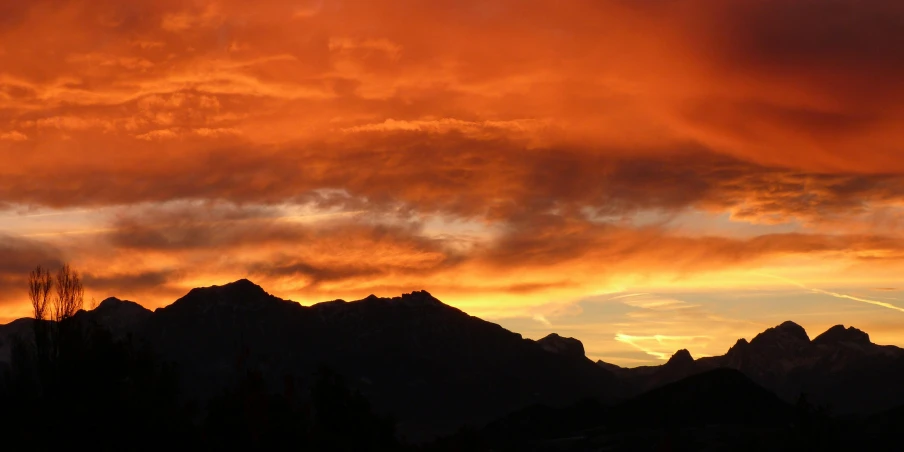 a view of a mountain range at sunset, by Charlotte Harding, pexels contest winner, romanticism, blood red sky, alpes, # nofilter, avatar image