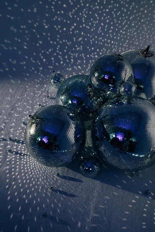 a bunch of blue christmas balls sitting on top of a table, a raytraced image, by David Donaldson, unsplash contest winner, disco party, pbr materials, album cover, light particules