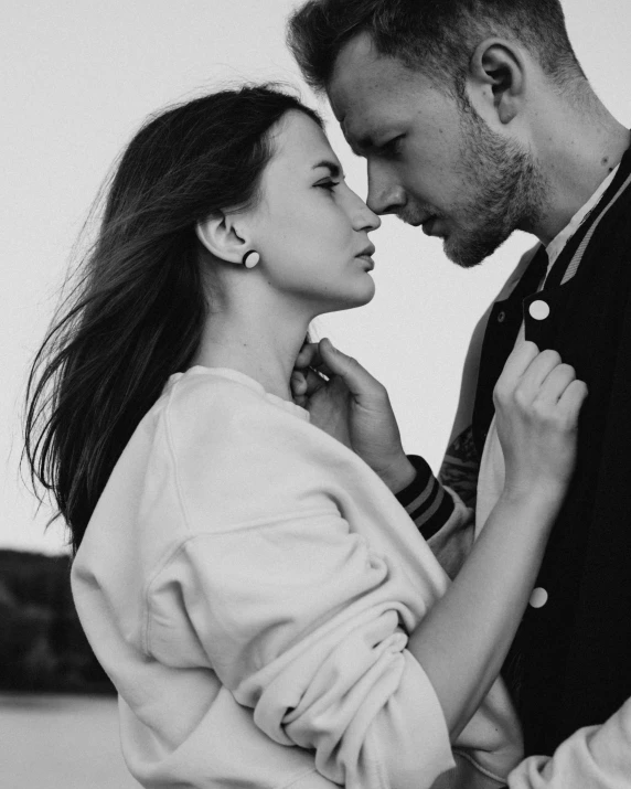 a man and woman standing next to each other, a black and white photo, by Adam Marczyński, pexels contest winner, attractive girl, marton gyula kiss ( kimagu ), 15081959 21121991 01012000 4k