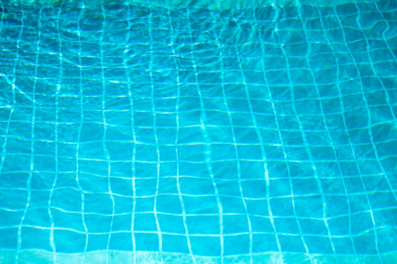 the bottom of a swimming pool with clear water, by Anna Haifisch, hurufiyya, squares, wrapped blue background, thomas kinkad, blog-photo