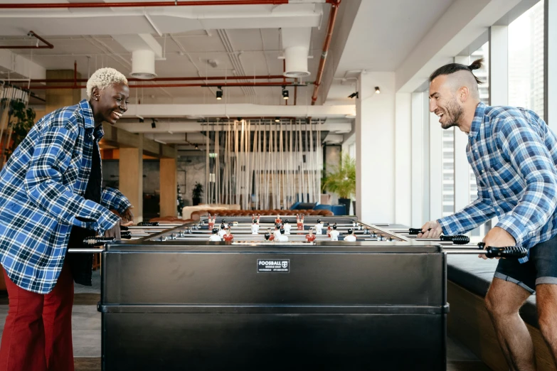 two men playing a game of foo foo foo foo foo foo foo foo foo foo foo foo, trending on unsplash, happening, in a open-space working space, 9 9 designs, professional sports style, hyper realistic ”