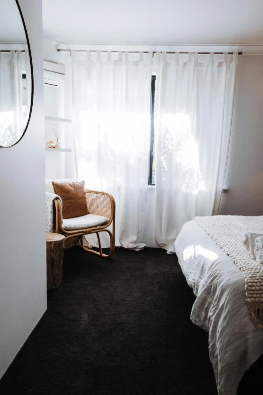 a white bed sitting in a bedroom next to a window, light and space, manuka, manly, indoor picture