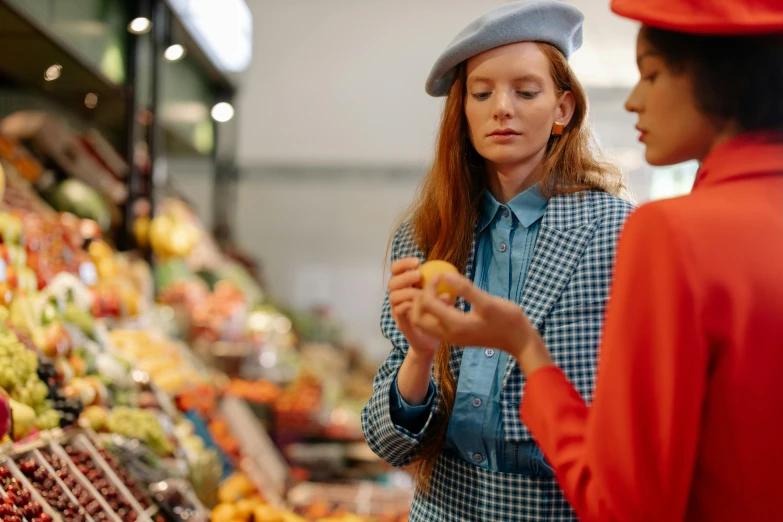 a couple of women standing next to each other in a produce section, pexels, hyperrealism, wearing a french beret, inspect in inventory image, woman with red hair, complaints