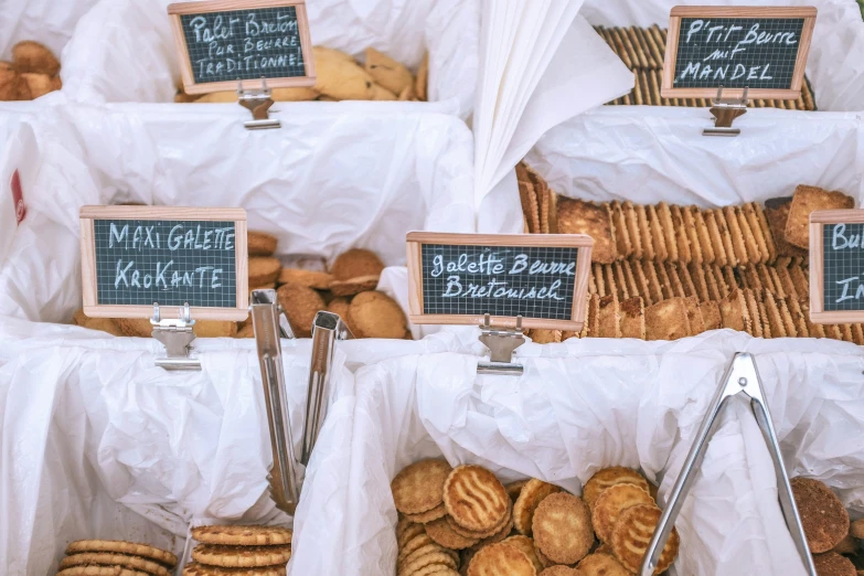 a bunch of baskets filled with different kinds of cookies, by Daniel Lieske, pexels, art nouveau, northern france, bright daylight, thumbnail, high quality photo