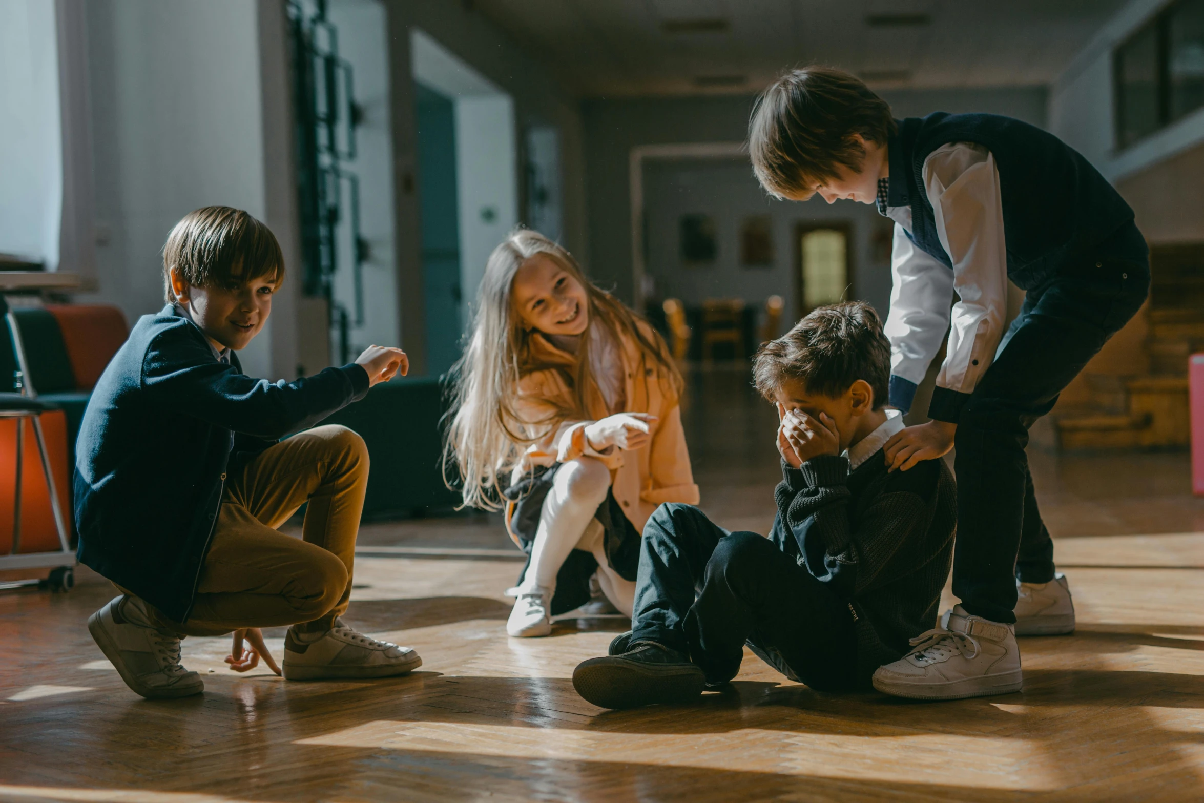 a group of young children sitting on the floor, by Adam Marczyński, pexels contest winner, barbizon school, getting ready to fight, roleplay, kneeling at the shiny floor, promotional image