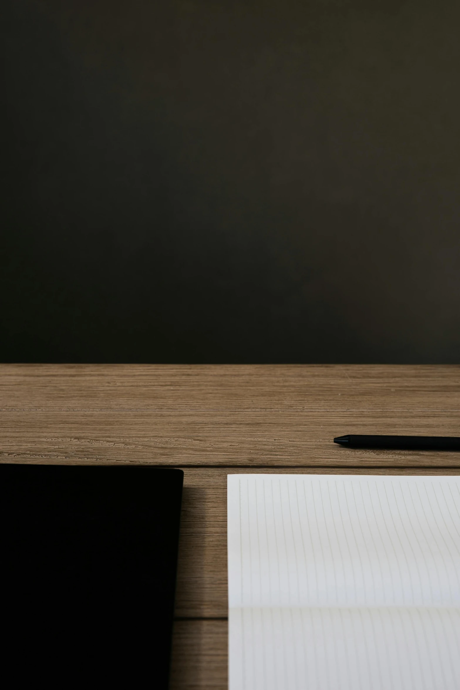 a laptop computer sitting on top of a wooden desk, by Harvey Quaytman, unsplash, minimalism, clean lines in dark pen, lacquered oak reception desk, texture detail, dwell