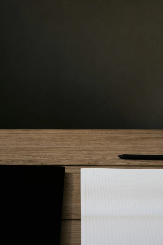 a laptop computer sitting on top of a wooden desk, by Harvey Quaytman, unsplash, minimalism, clean lines in dark pen, lacquered oak reception desk, texture detail, dwell