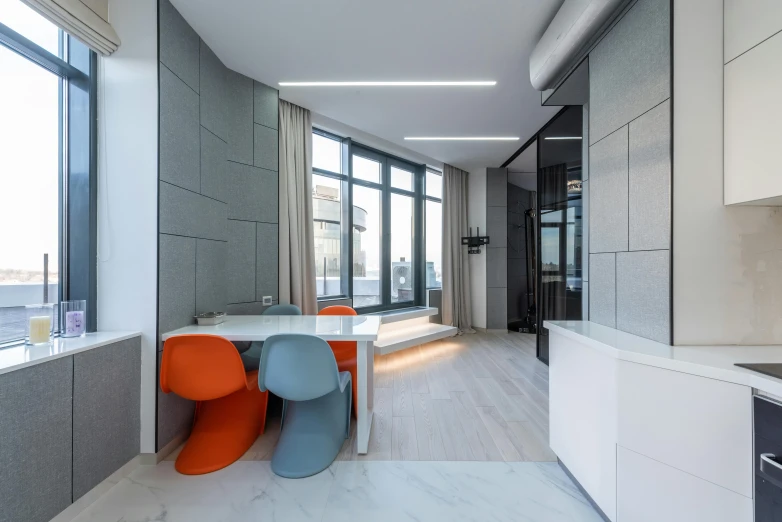 a kitchen with a table and chairs next to a window, by Adam Marczyński, light and space, gray and orange colours, office ceiling panels, neo kyiv, penthouse