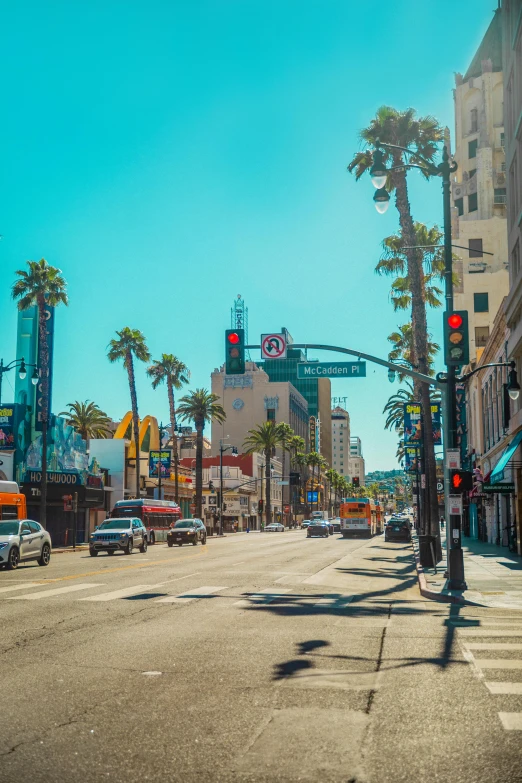 a street filled with lots of traffic next to tall buildings, renaissance, hollywood promotional image