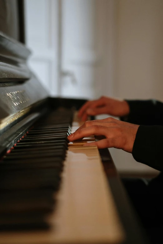 a close up of a person playing a piano, by Jakob Emanuel Handmann, paul barson, yuxiang chen, hammershøi, greg rutkowski ”