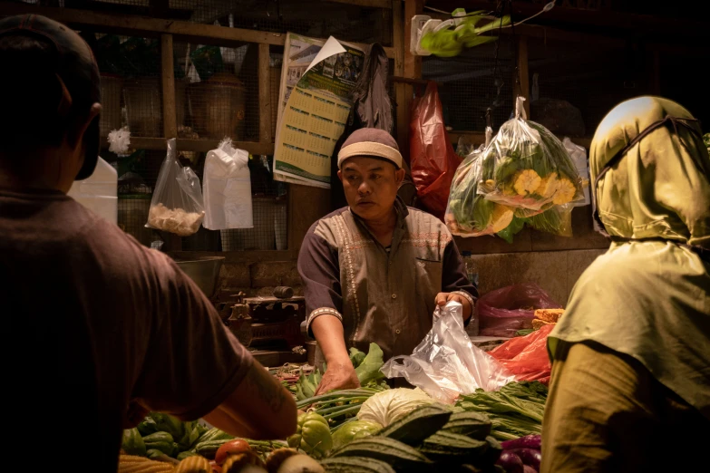 a group of people standing around a vegetable stand, by Meredith Dillman, pexels contest winner, sumatraism, close to night, avatar image, square, thumbnail