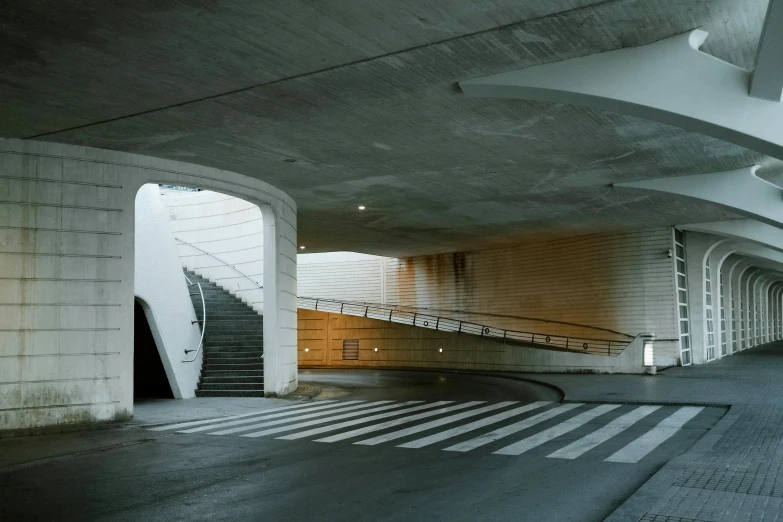 a red fire hydrant sitting on the side of a road, an album cover, by Tadao Ando, conceptual art, stairs and arches, subway station, white concrete, alessio albi