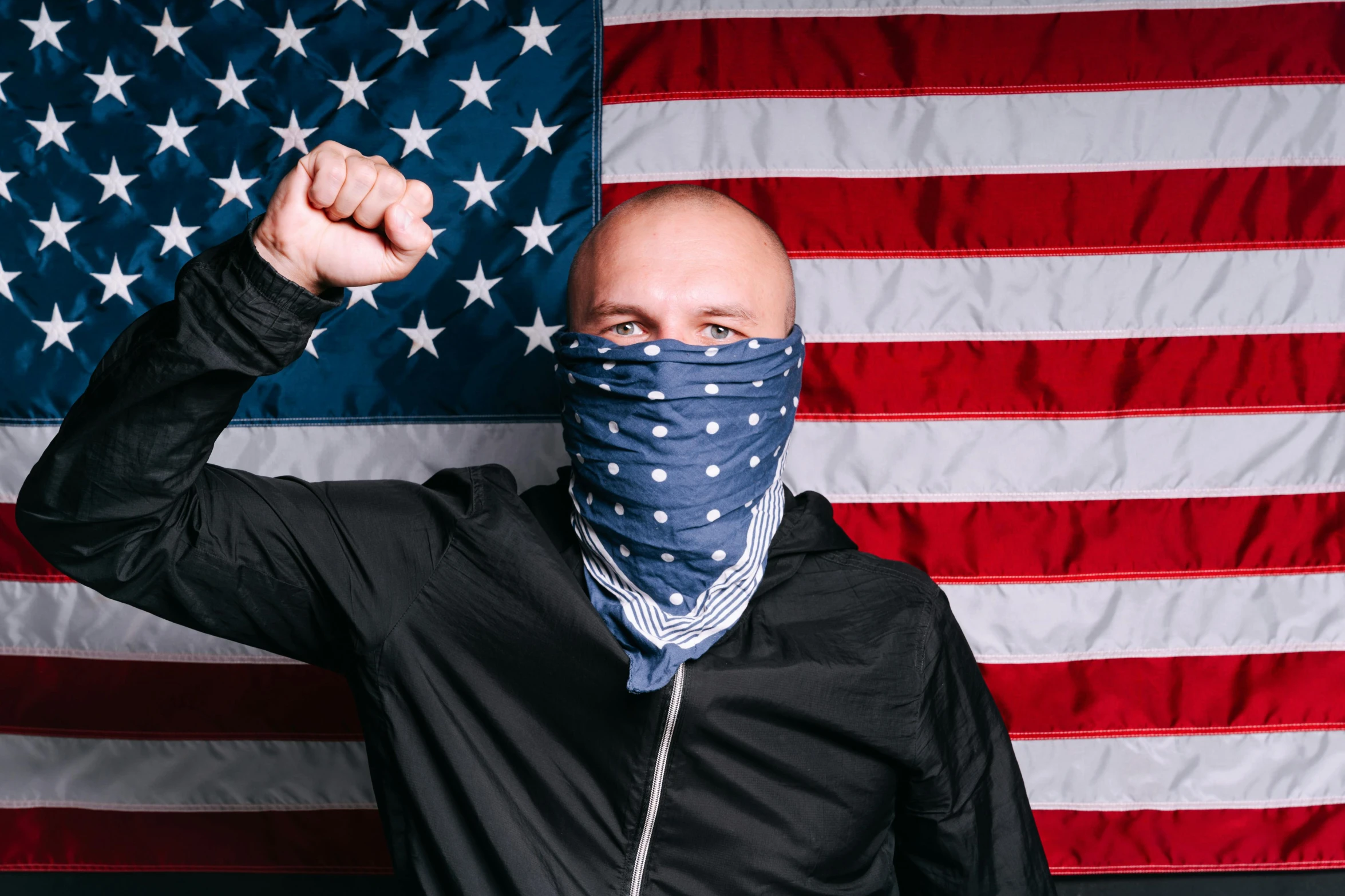 a bald man wearing a bandana in front of an american flag, inspired by Brian 'Chippy' Dugan, unsplash, aggressive pose, masked, mr clean, state of the union