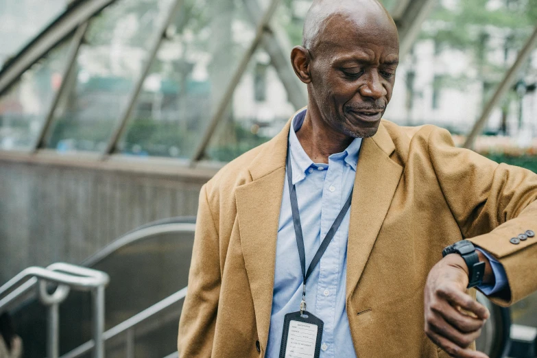 a close up of a person wearing a watch, a photo, by Joseph Severn, holding a briefcase, emmanuel shiru, an old man, thumbnail