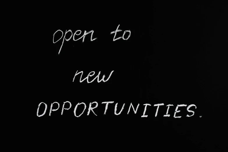 a blackboard with the words open to new opportunities written on it, by Georgina Hunt, pixabay, new objectivity, in the style of john baldessari, advert, background image, black