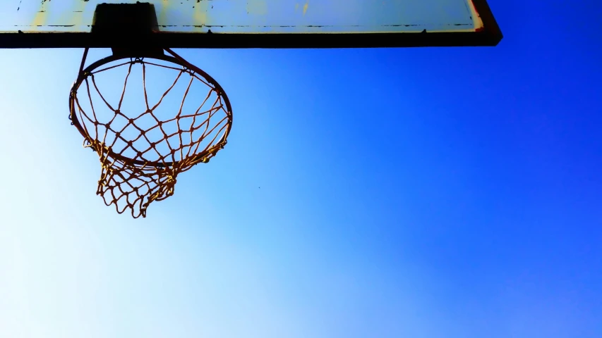a basketball hoop with a blue sky in the background, by Niko Henrichon, gopro photo, dynamic low angle shot, 2 0 0 0's photo, nets