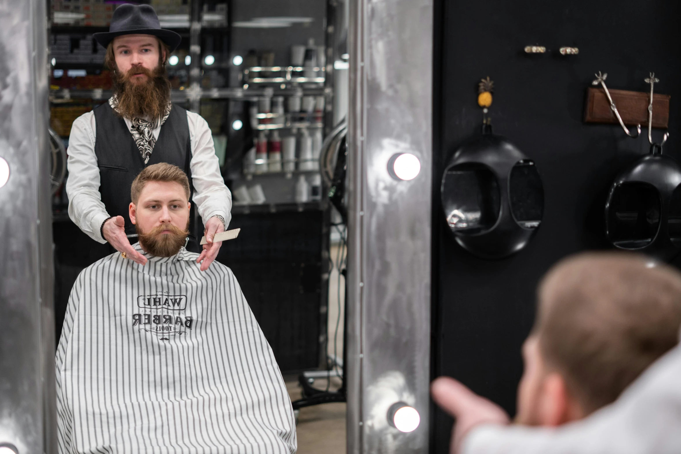 a man getting his hair cut at a barber shop, by Jaakko Mattila, silver full beard, costumes from peaky blinders, thumbnail, press shot