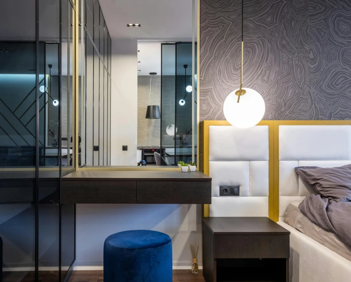 a bed room with a neatly made bed and a mirror, by Adam Marczyński, white + blue + gold + black, neo kyiv, thumbnail, premium bathroom design