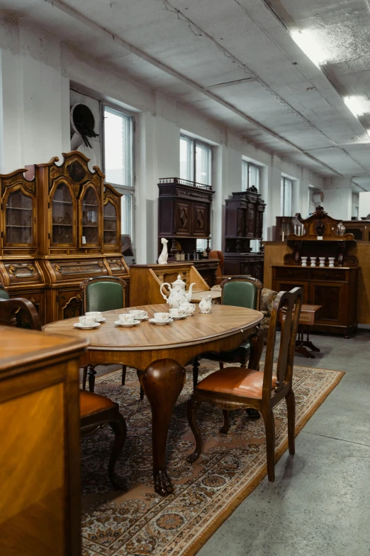 a room filled with lots of wooden furniture, by Konrad Witz, unsplash, arts and crafts movement, inspect in inventory image, фото девушка курит, nikolay georgiev, auction catalogue photo