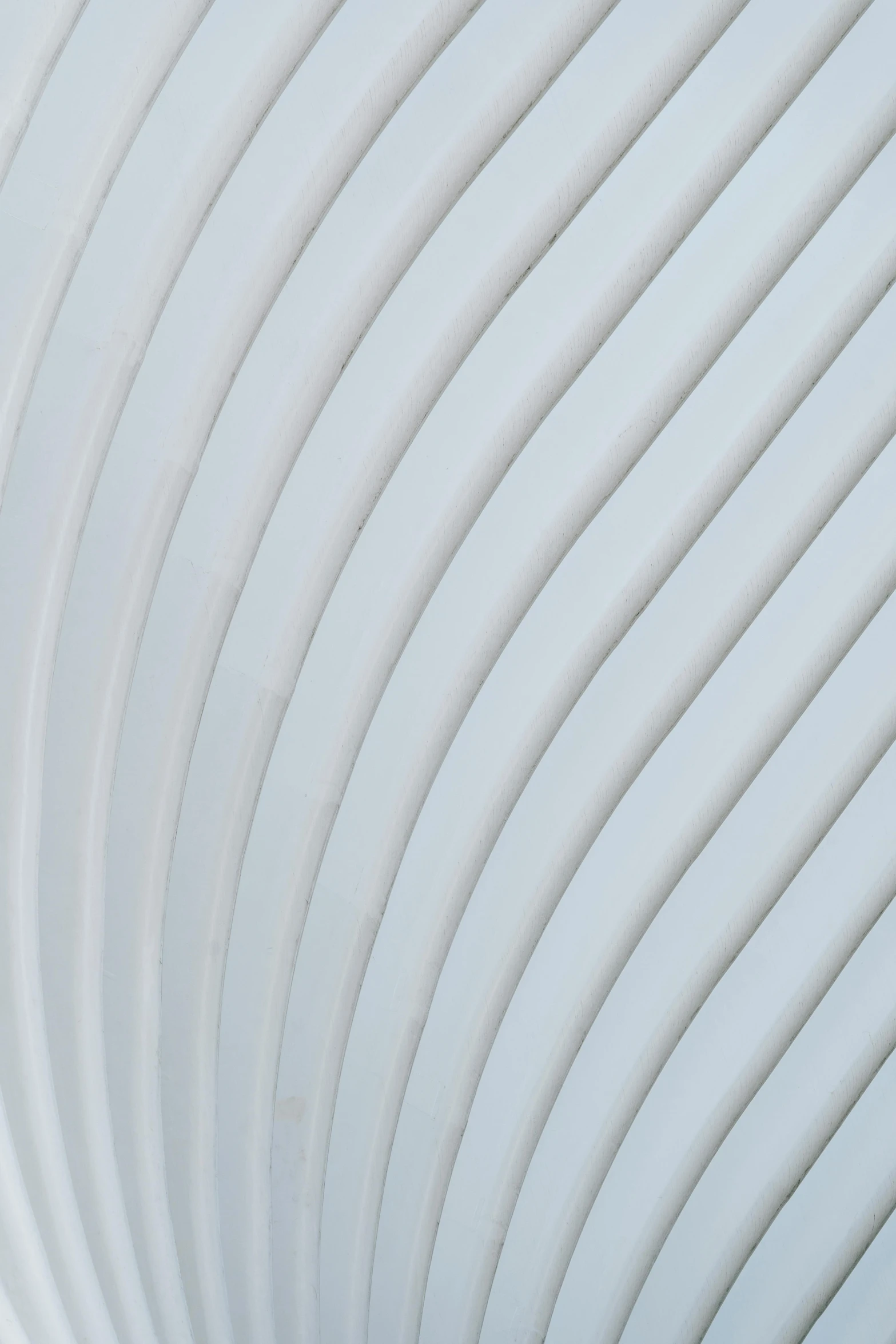 a man flying a kite on top of a blue sky, an abstract sculpture, by Julian Allen, glossy white metal, detail texture, ((waves, white and pale blue