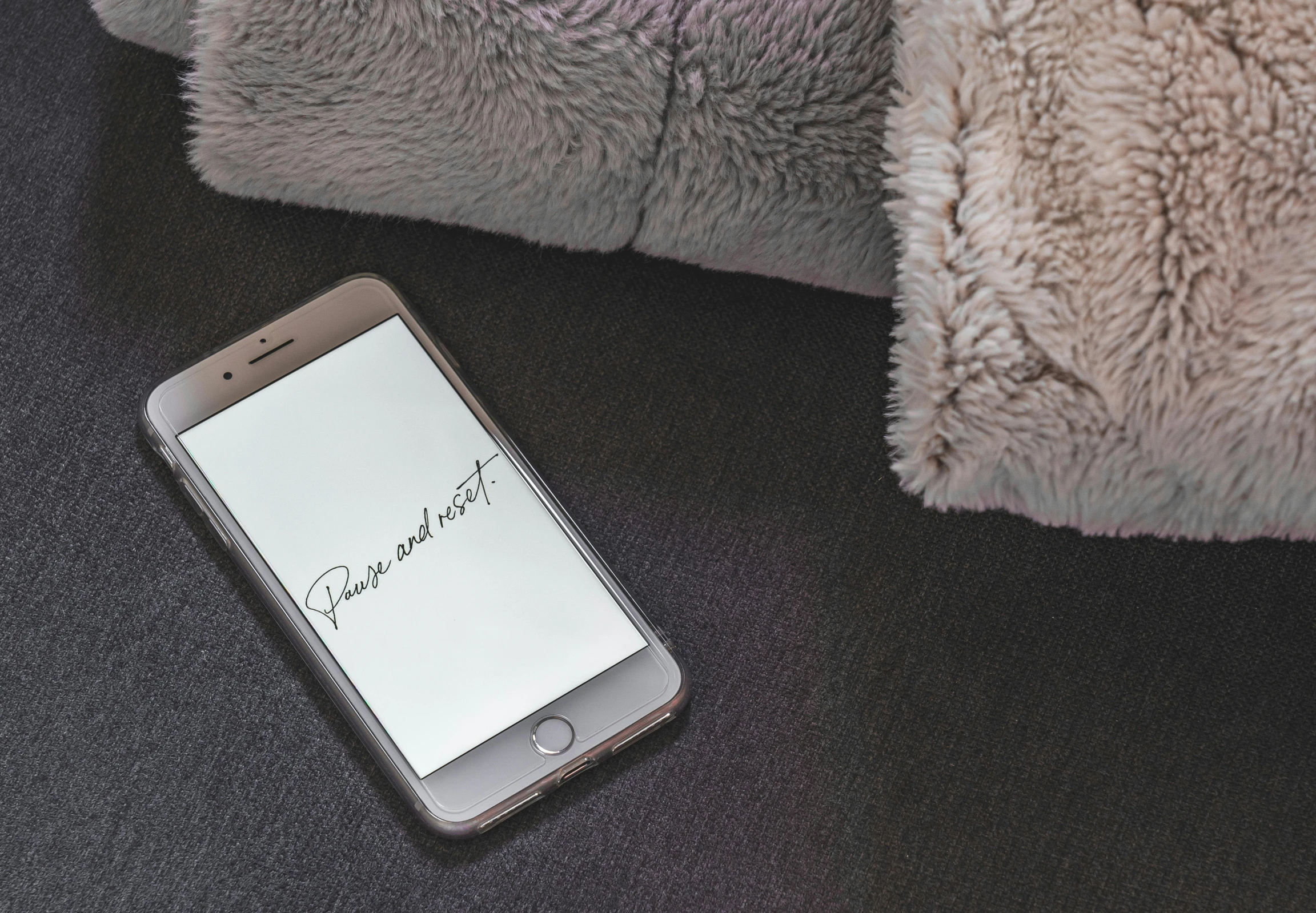a cell phone sitting next to a teddy bear, pexels contest winner, “modern calligraphy art, white bed, background image, embroidered velvet